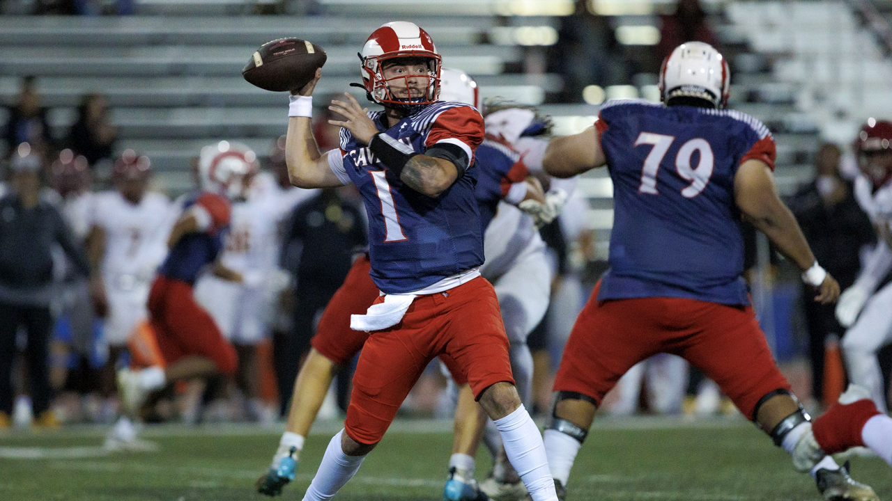 Quarterback Ethan Chrisman tossed 2 touchdowns in the Rams' season finale at Hartnell. (Photo by Chris Mora /chrismoraphoto.com)